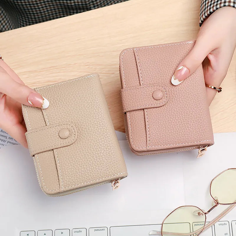 Ladies short wallet with lychee pattern texture showing 2-fold compact design