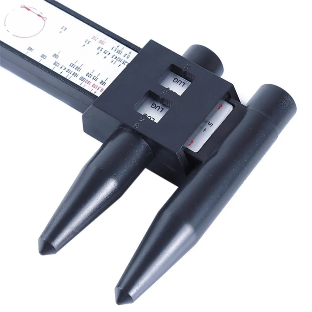 Electronic digital plastic caliper for measuring hole distances, shown with digital display.