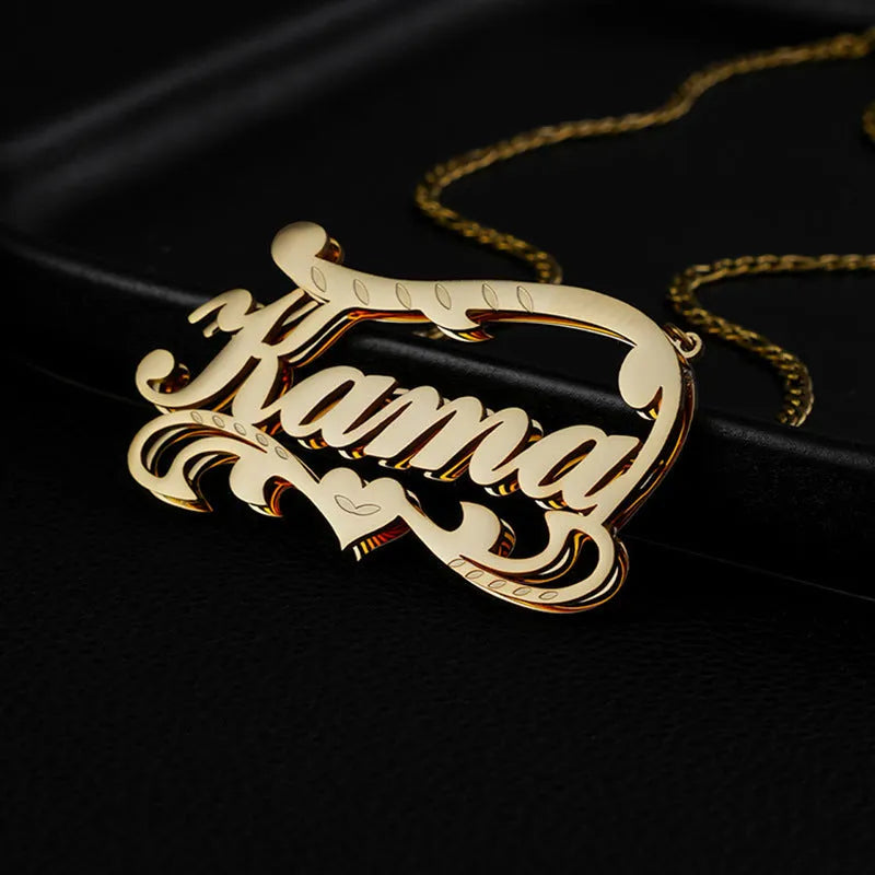 Gold personalised stainless steel necklace with a double-layer wave heart pendant engraved with a name.