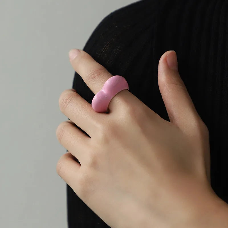 Heart-shaped ring with raised three-dimensional enamel detailing in a choice of colours