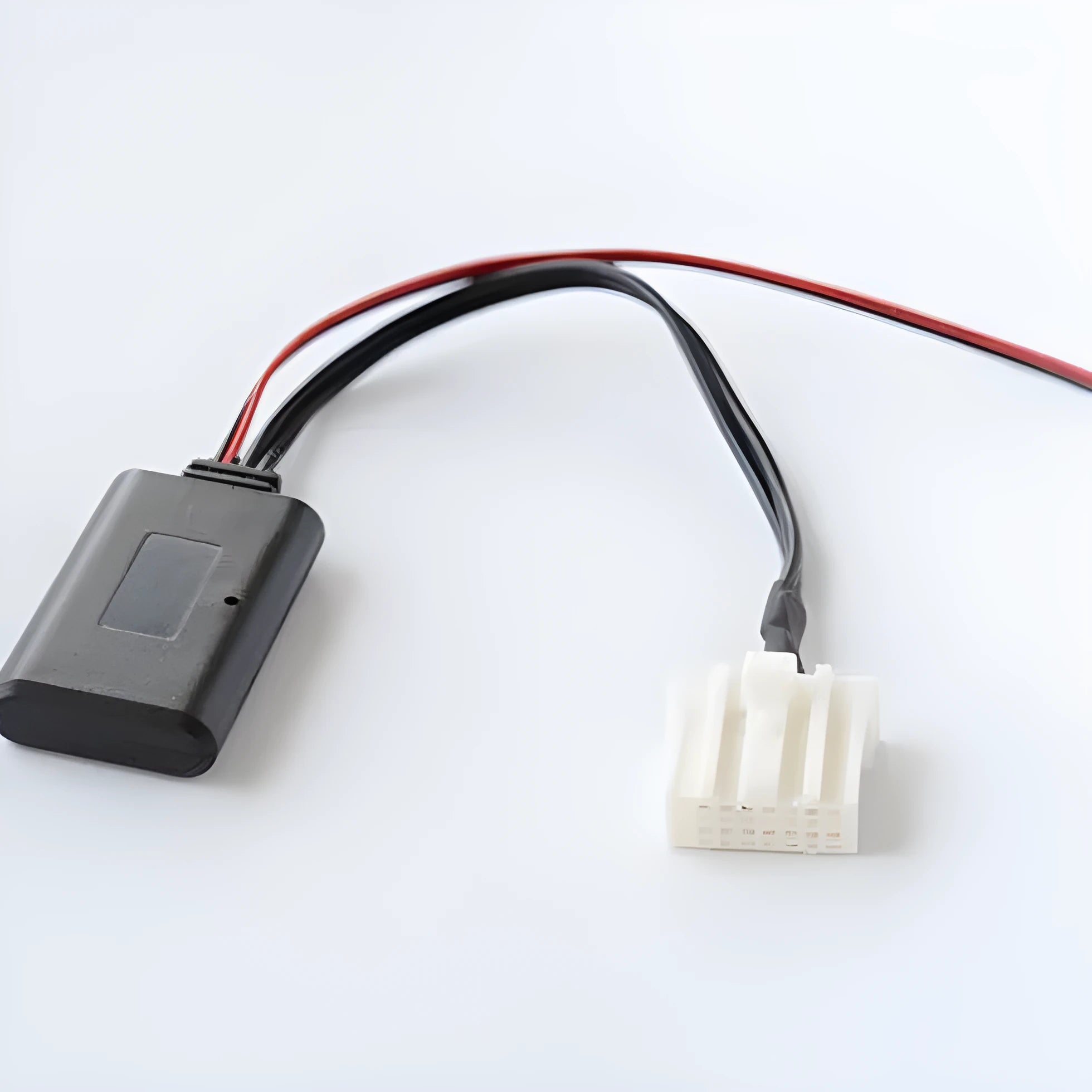 Black Bluetooth audio adapter cable for Mazda cars with aux and MEDIA button.
