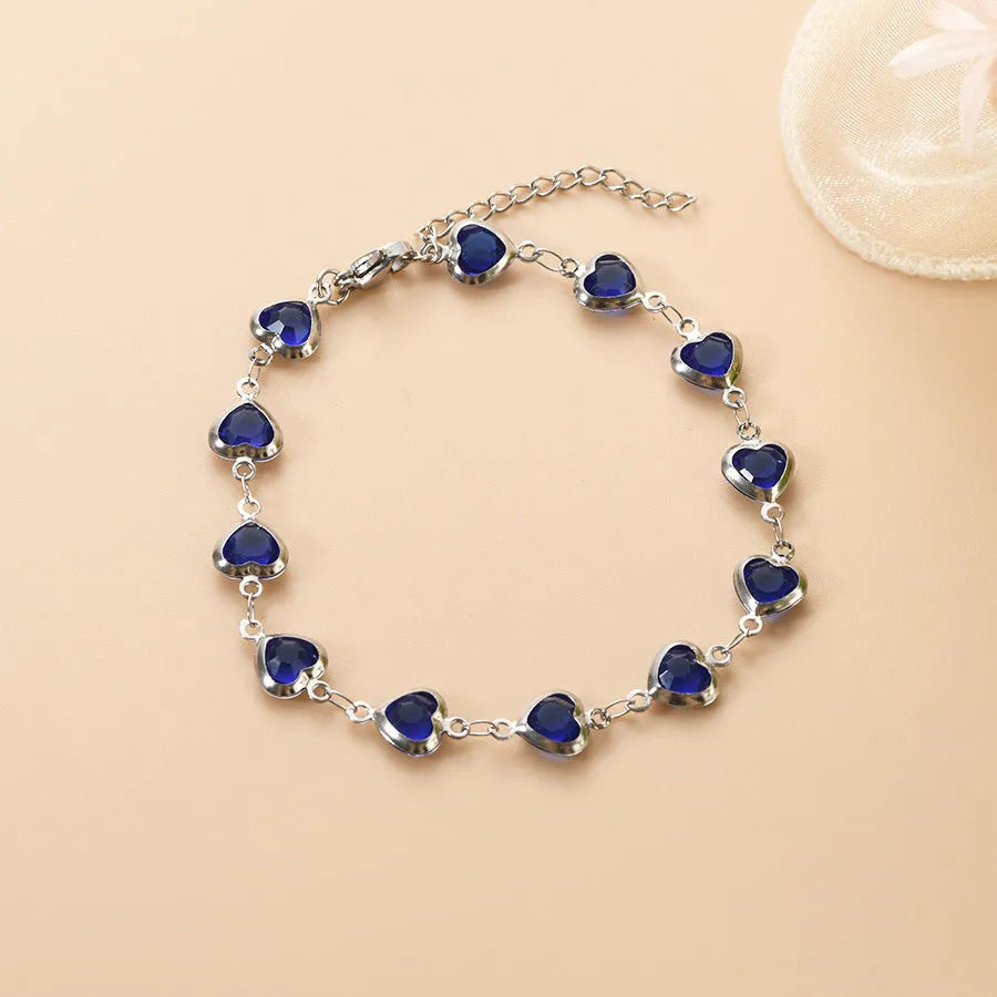 Unisex stainless steel geometry heart bracelet in a choice of six electroplated colours.