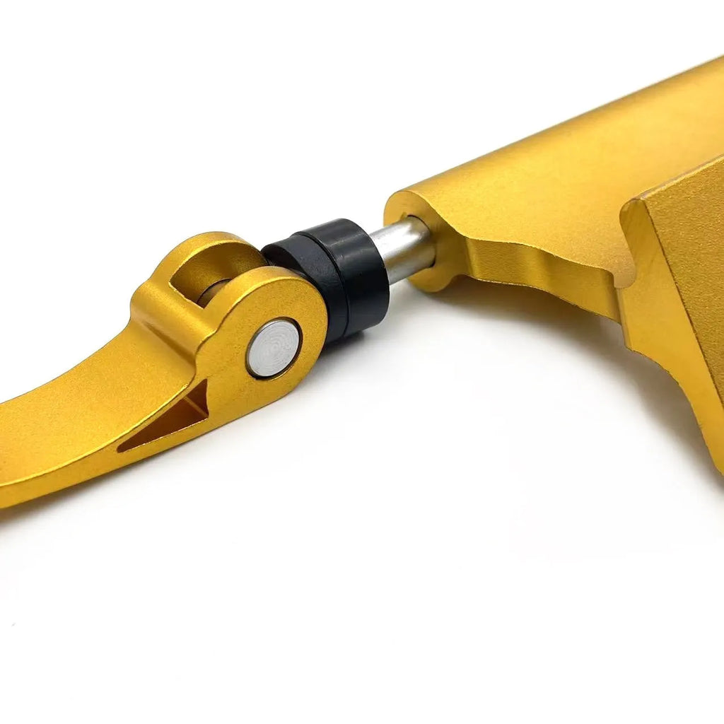 Silver metal quick-release clamp for securing a bicycle front fork during transport.