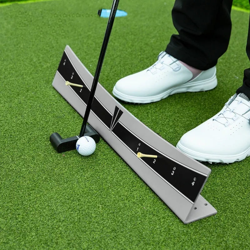 Adjustable golf putter trajectory balance simulator made from white PVC.