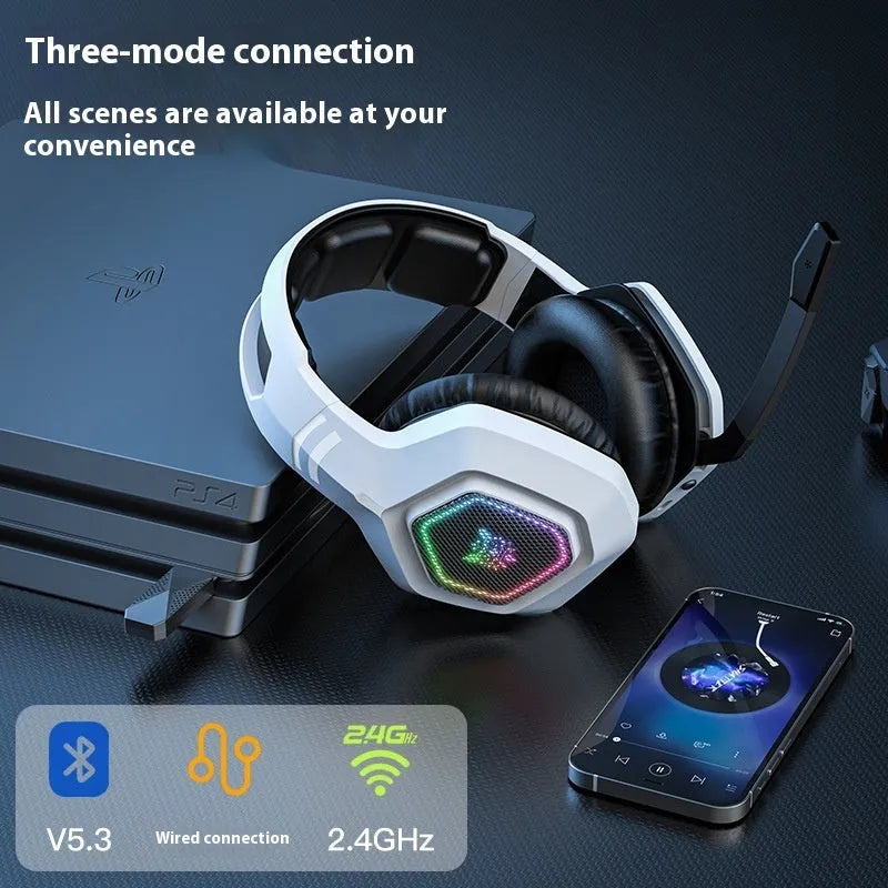 Black and white wireless gaming headset with RGB lighting showing 2.4G receiver and charging cable