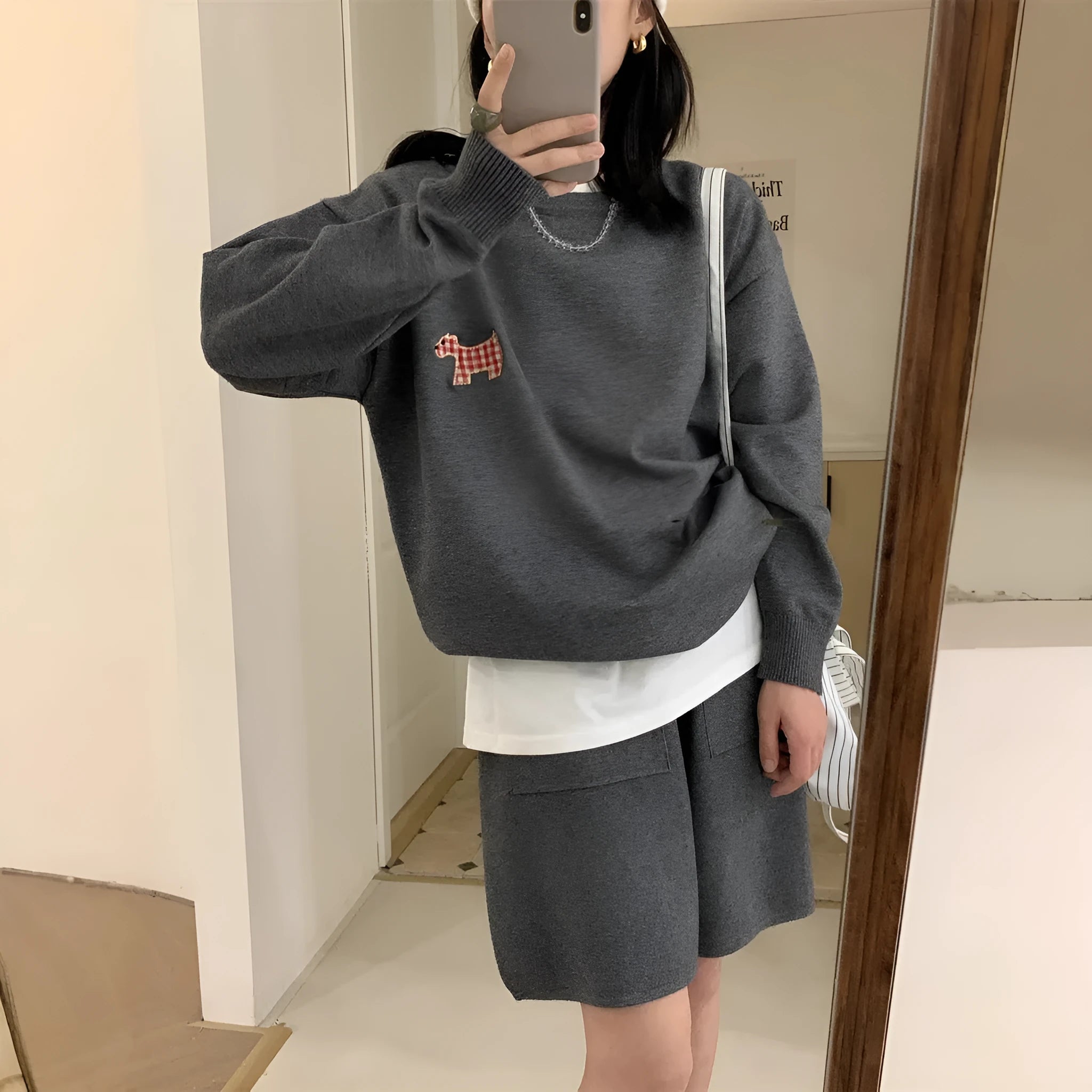Women's knitted sweater and shorts set with animal embroidery pattern in casual style