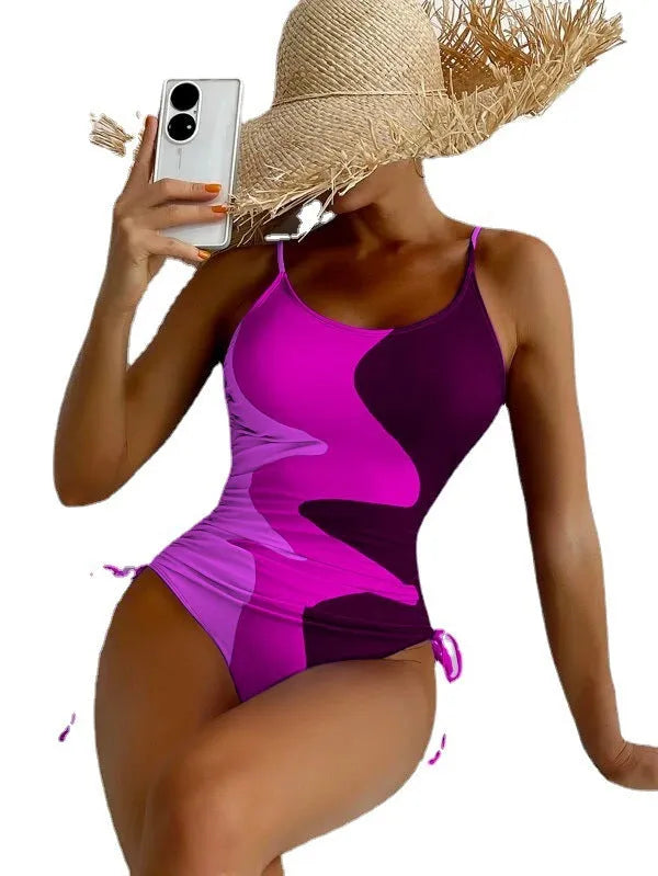 Women's blue sleeveless backless one-piece swimsuit with fixed swimming trunks for swimming sports