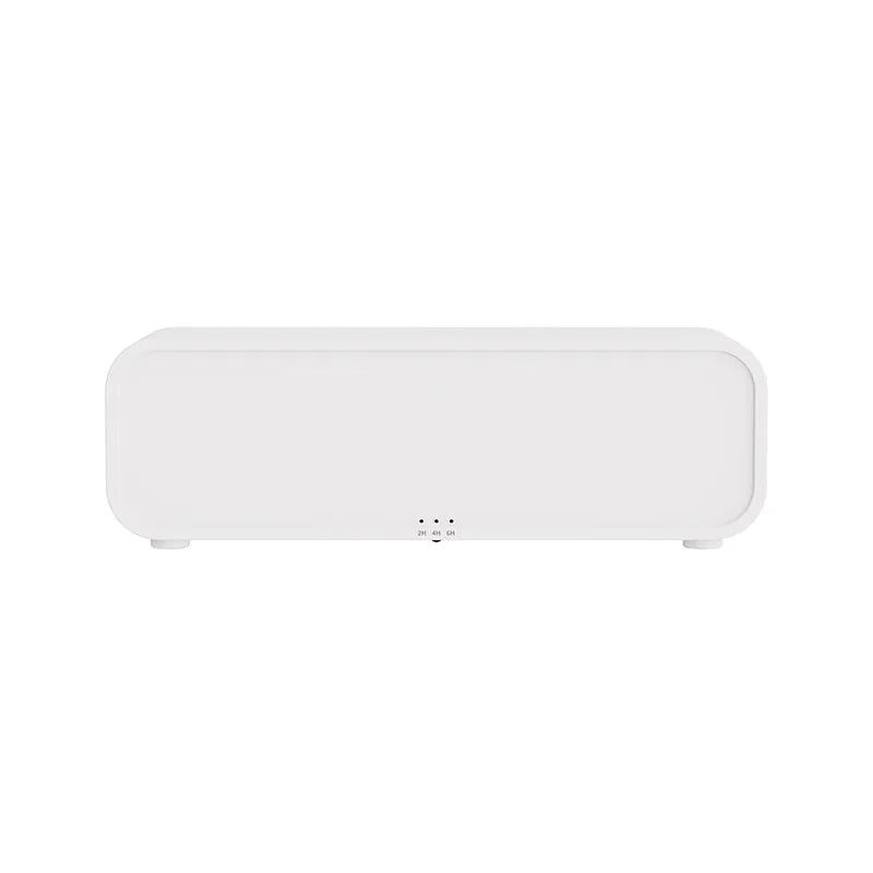 Black and white flame dynamic aroma diffuser with remote control on a wooden table