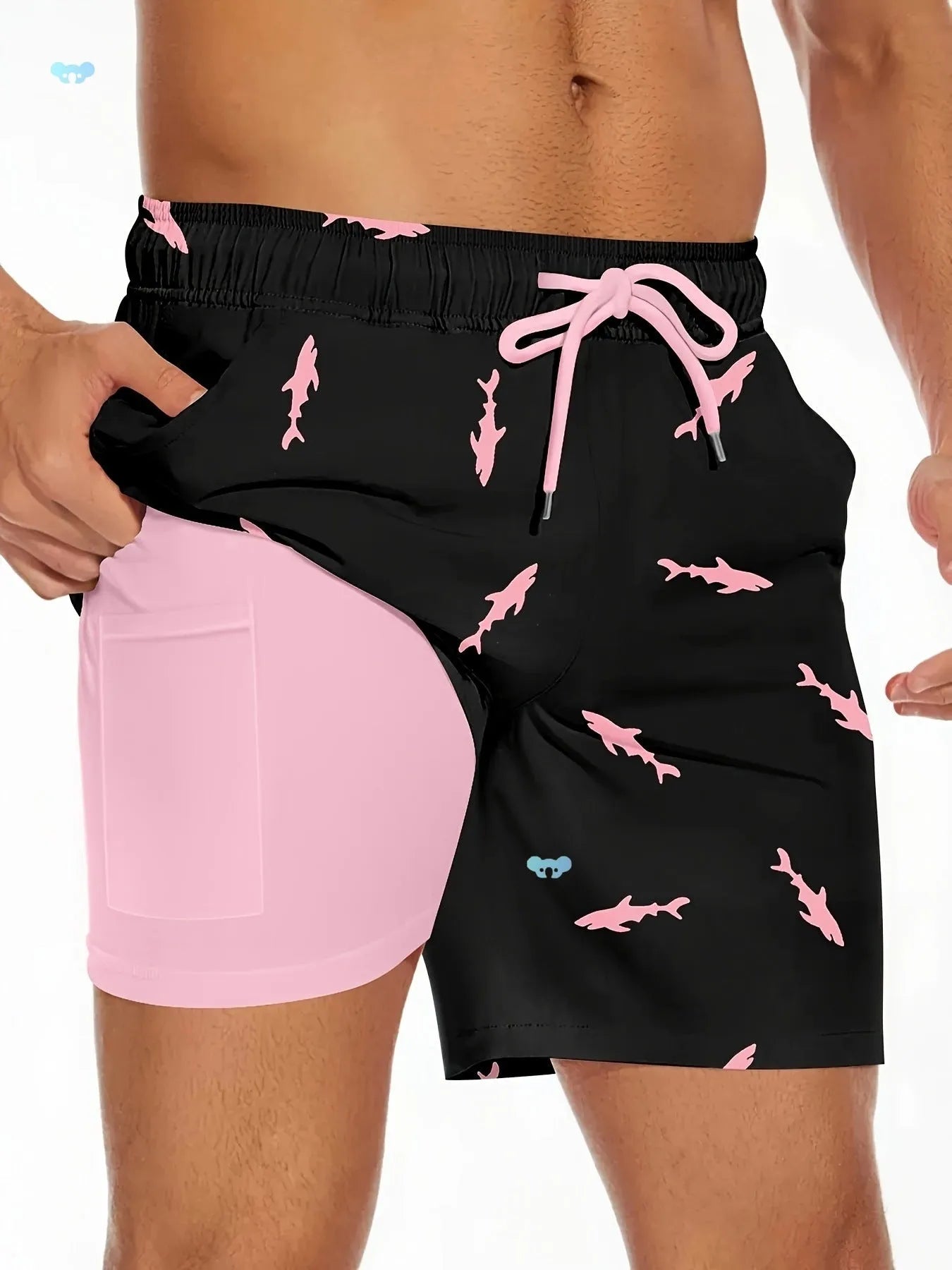 Men's black casual shorts with a white shark graphic print and a white drawstring waistband.