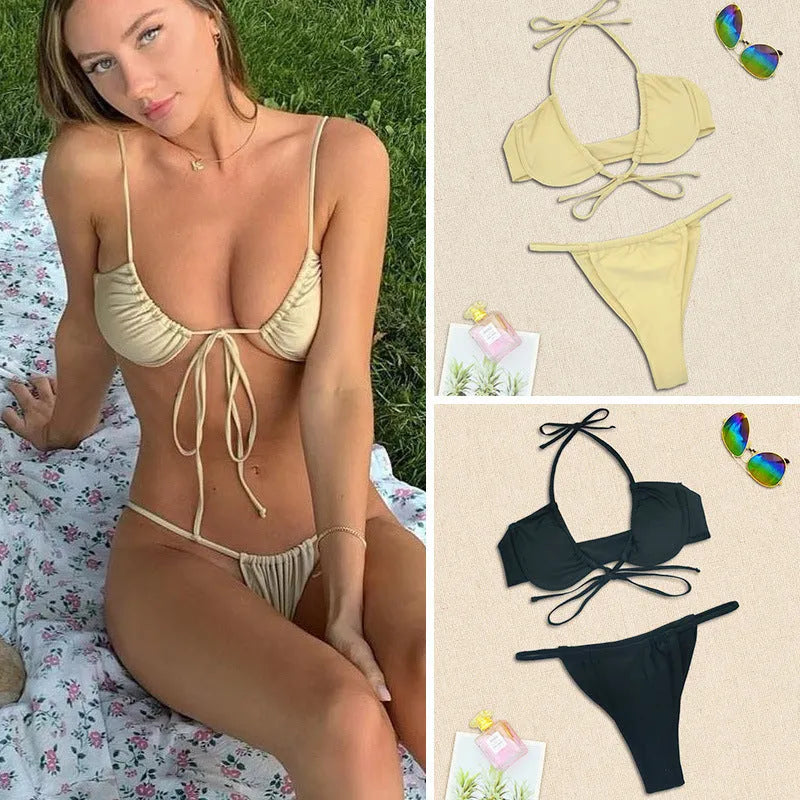 Women's black and mint green nylon fashion split bikini set on a mannequin