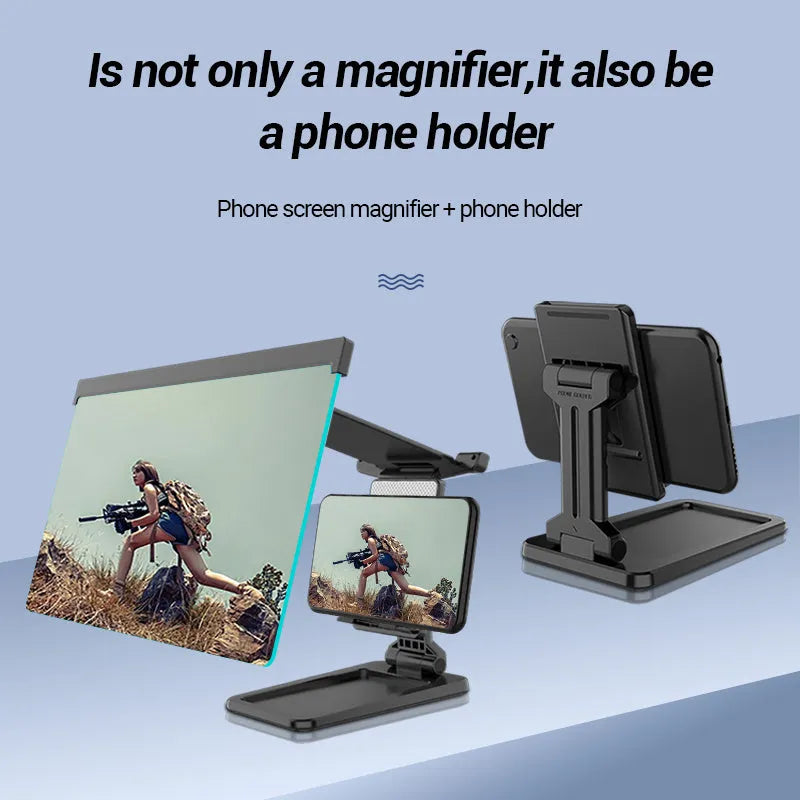Black folding mobile phone screen amplifier with detachable holder on a desktop.