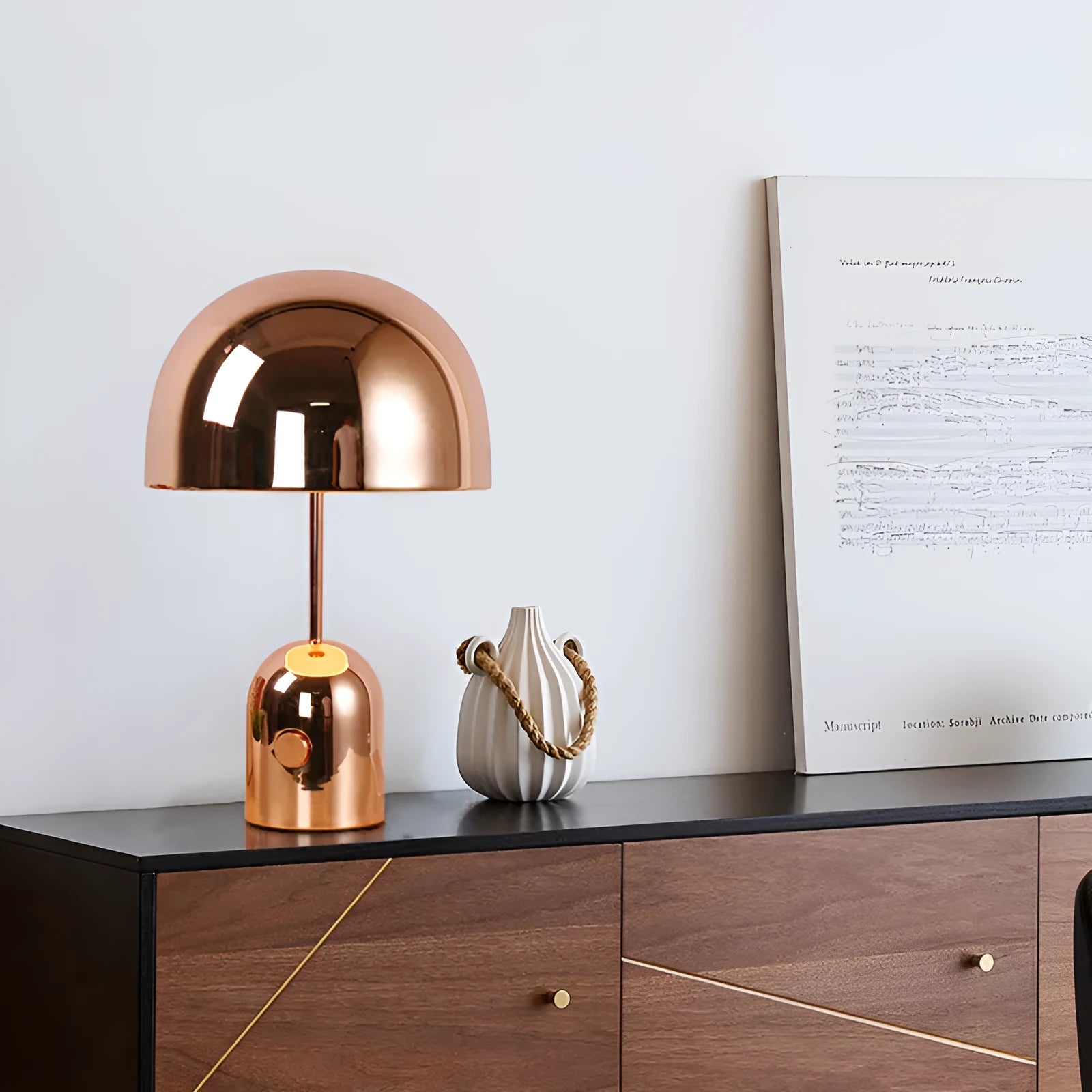 Mushroom table lamp with metal base in rose gold finish measuring 280mm wide