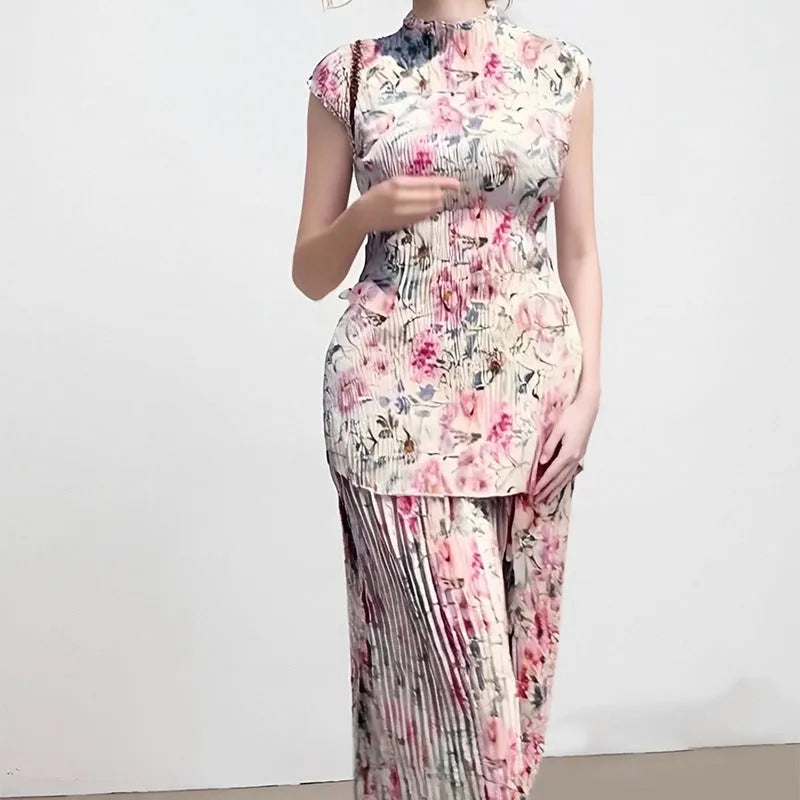 Women's long sleeve printed chiffon top paired with a high waist matching skirt.