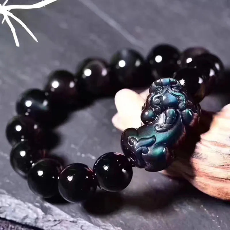 Natural eye obsidian bracelet with grey and black banding, showing multiple bead size options