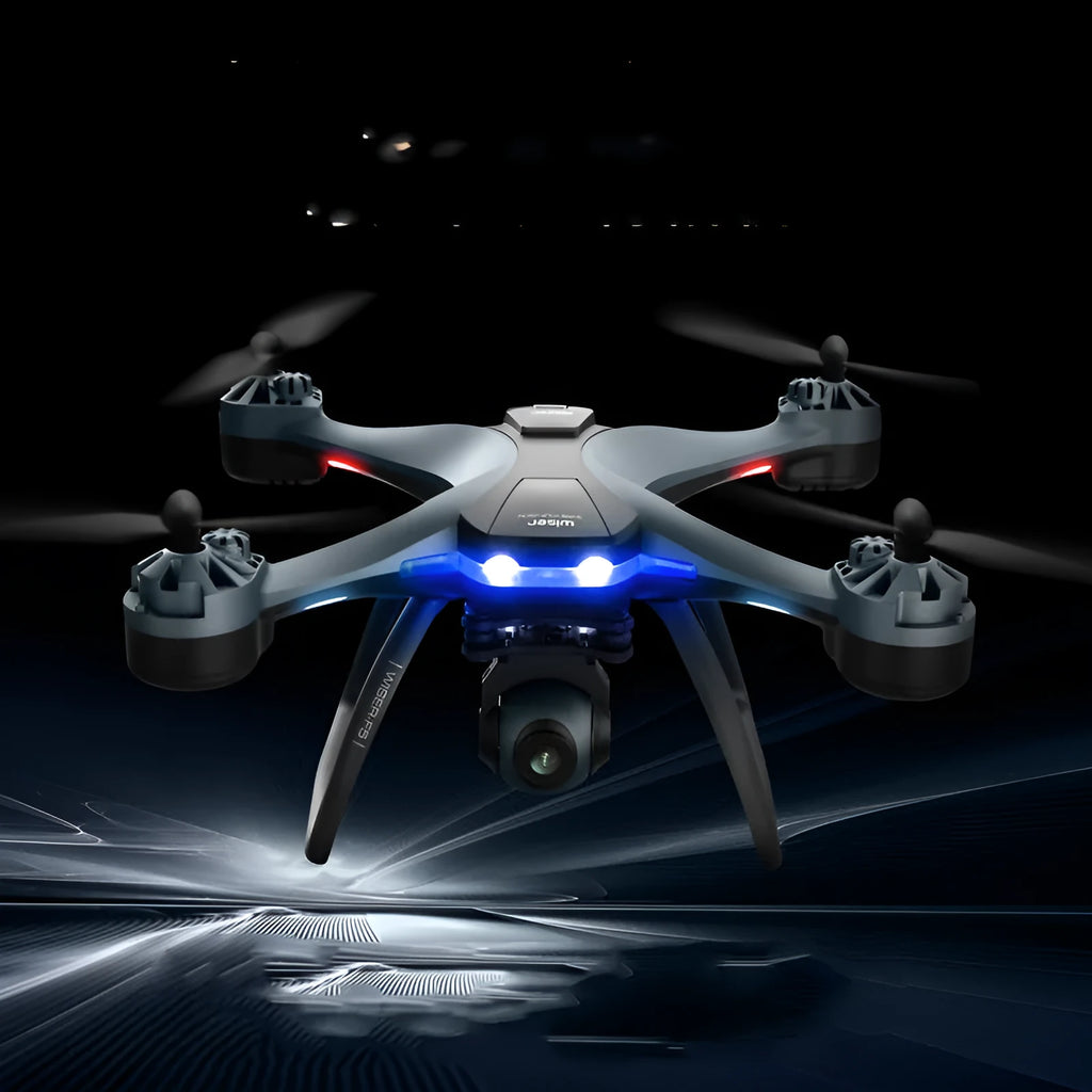 Black plastic quadrocopter drone with four propellers, a camera on front, and a remote control handle.