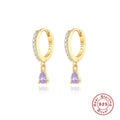 Sterling silver geometric water drop earrings with a gemstone accent on a gold or silver plated finish.