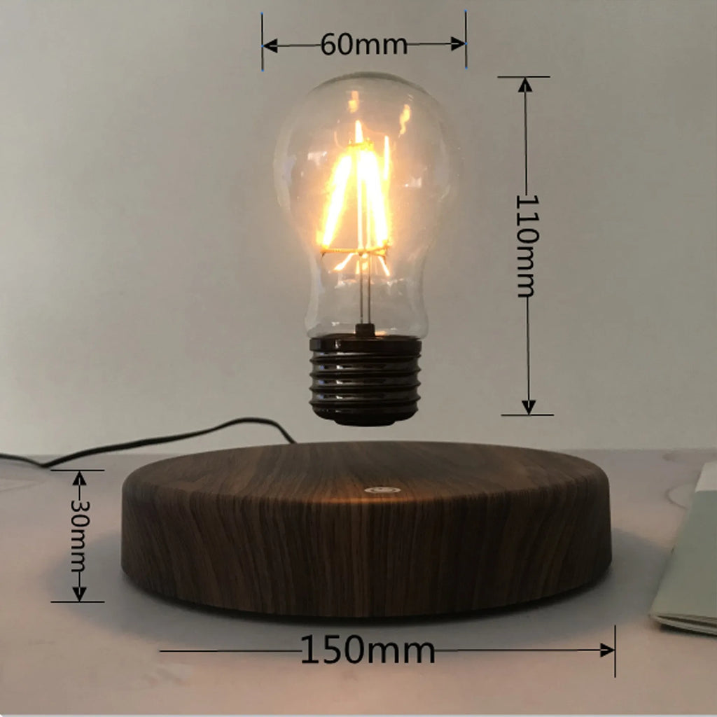 Magnetic levitation bulb night light in solid wood colour with UK plug on a desk.