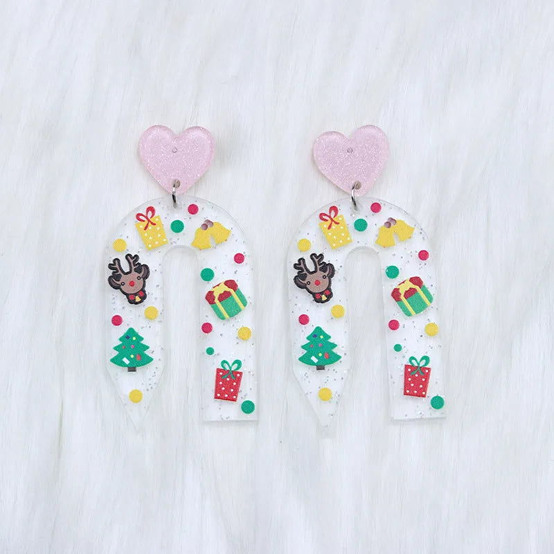 Christmas ear studs in acrylic with geometric shape and printed snowflake design, 6.5x3.1cm