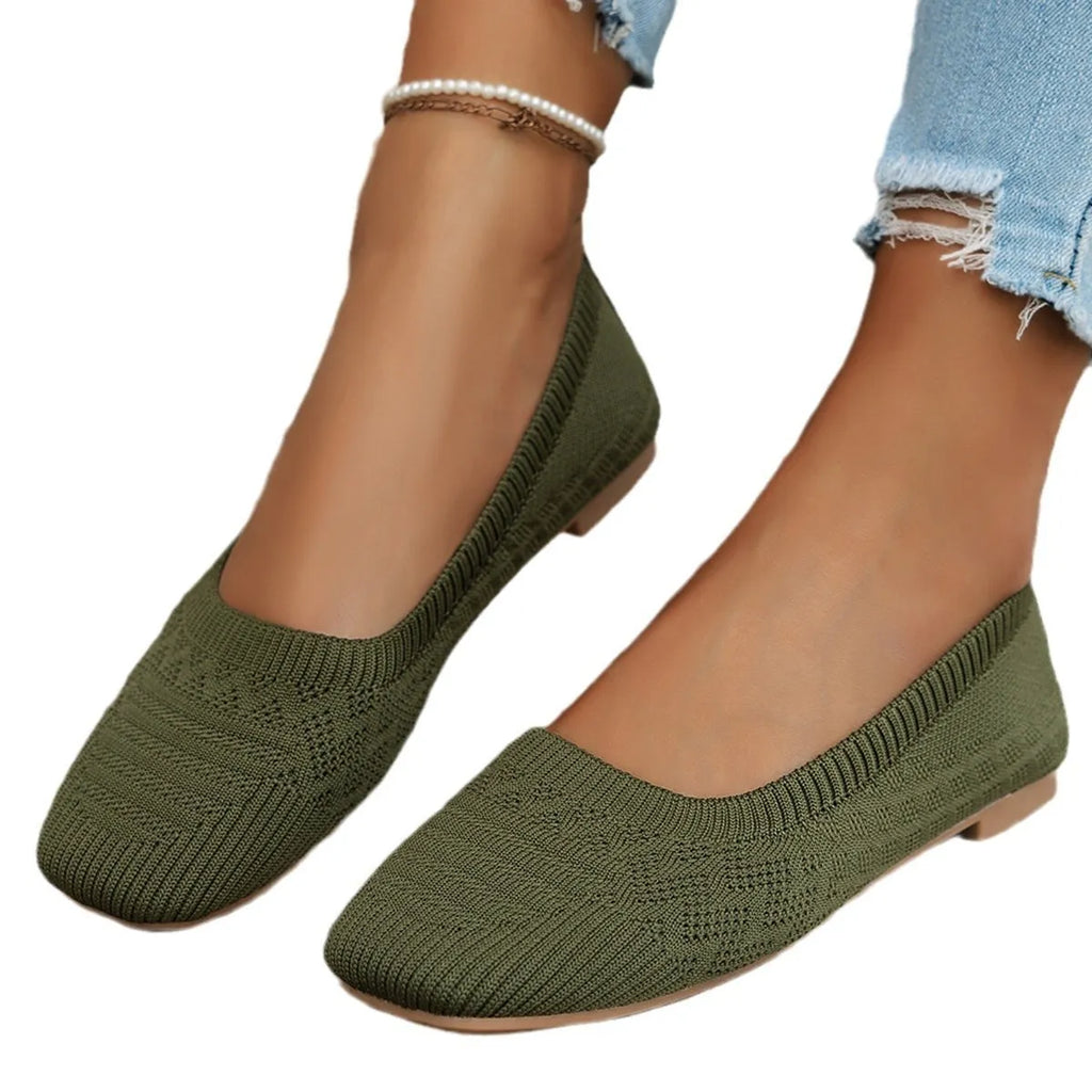 Women's knitted canvas slip-on shoes in black with flat heel and shallow mouth