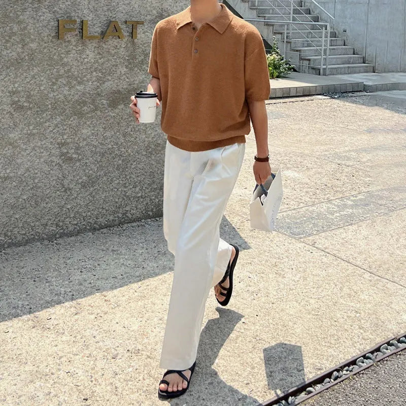 Retro-style men's caramel coloured knitted polo shirt with short sleeves and an asymmetric design detail.