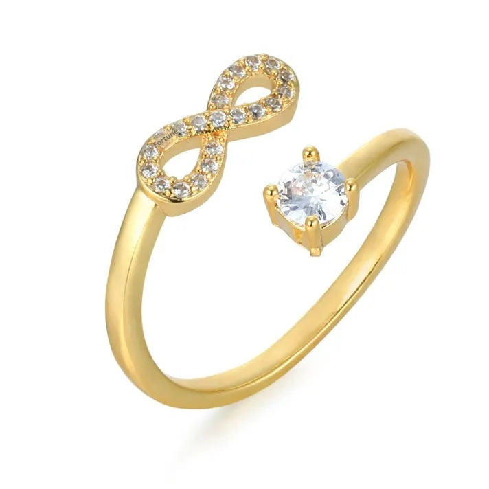 Geometric personalised letter ring with open diamond zircon setting in gold colour.