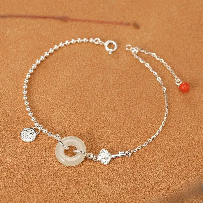 Hetian jade and 925 silver women's bracelet with geometric Chinese design and blessing card motif