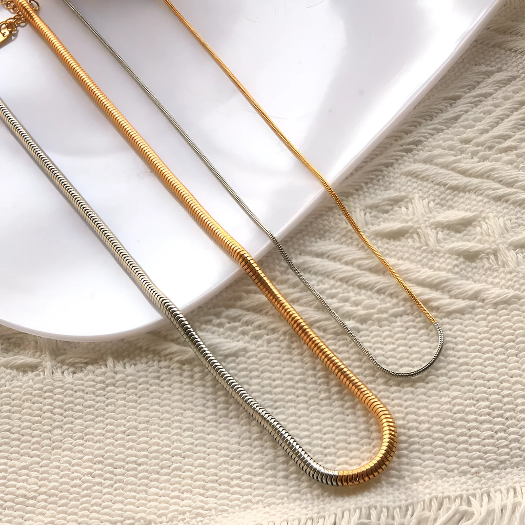 Golden stainless steel snake bones chain necklace, 3mm wide, for women's hip-hop fashion.