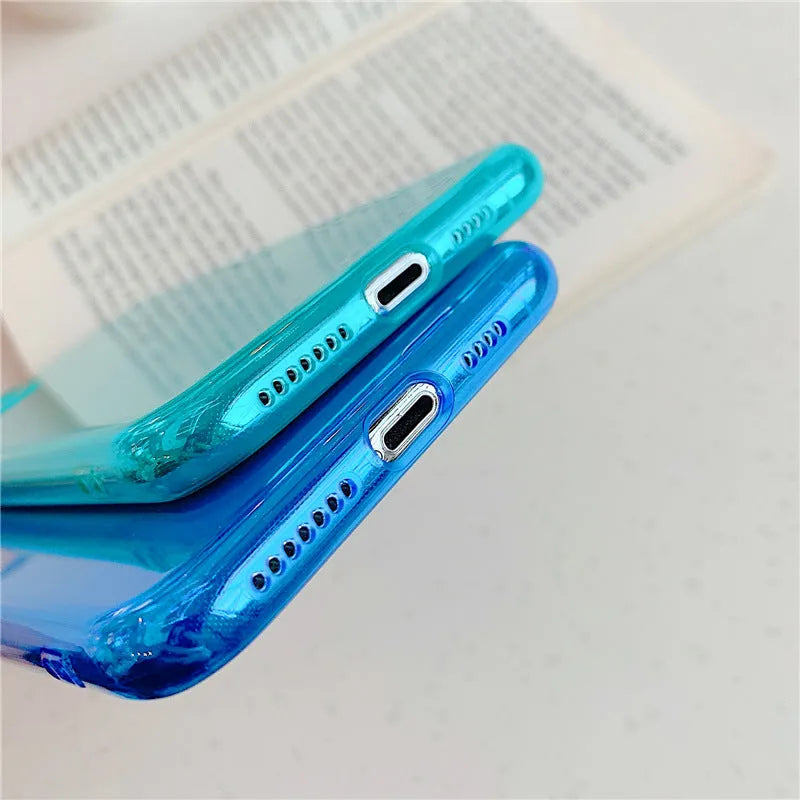 Transparent fluorescent TPU phone case in orange for iPhone 15 Pro Max showing slim back cover design