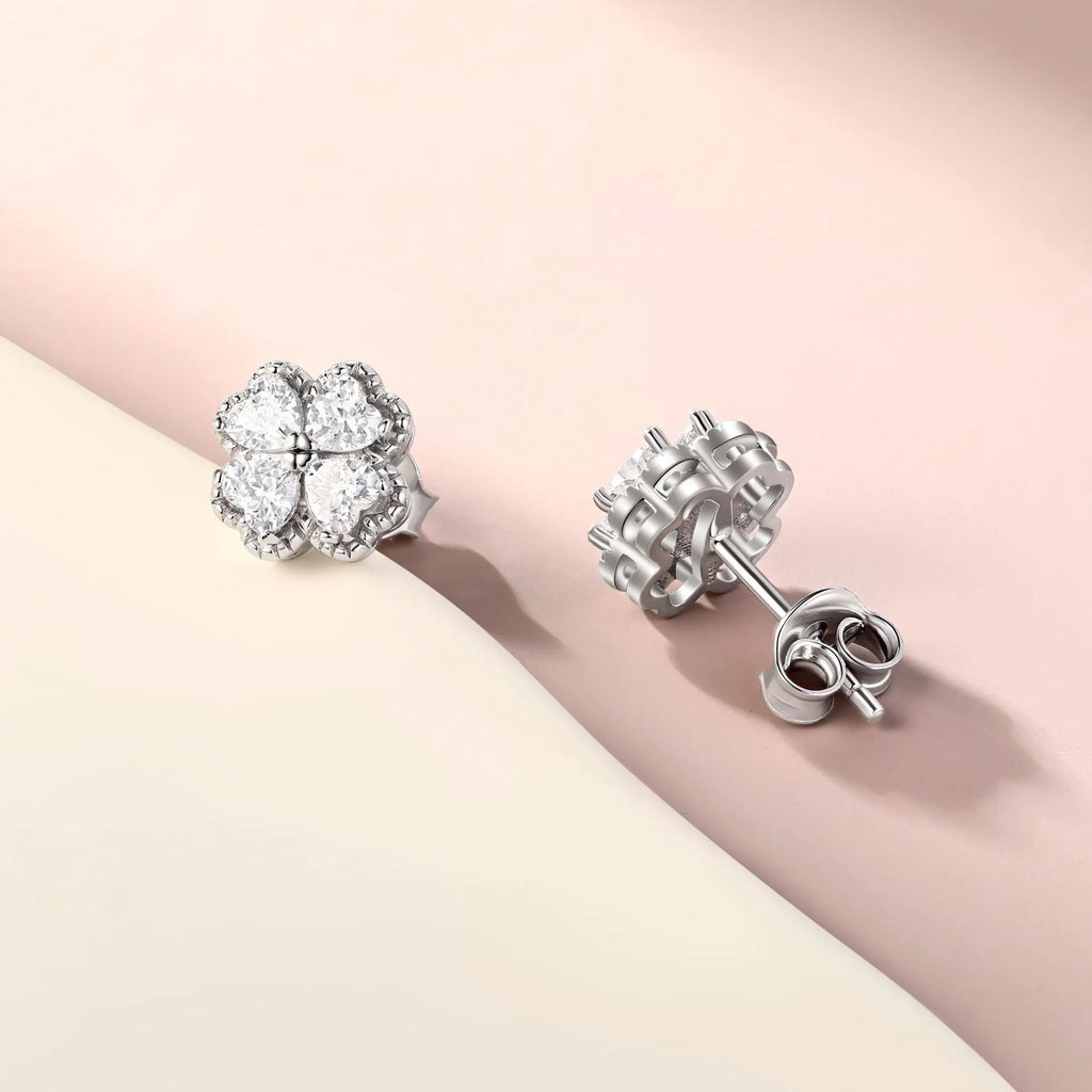 Pair of women's heart-shaped 925 silver earrings with four-leaf clover design and zircon stones.