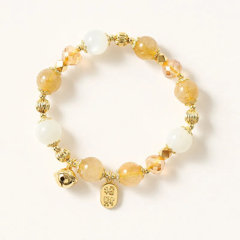 Gold electroplated rutilated quartz bracelet with faceted crystal beads in Lucky Fortune colour