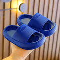 Children's bright coloured EVA slippers with a thick non-slip sole on a white background.