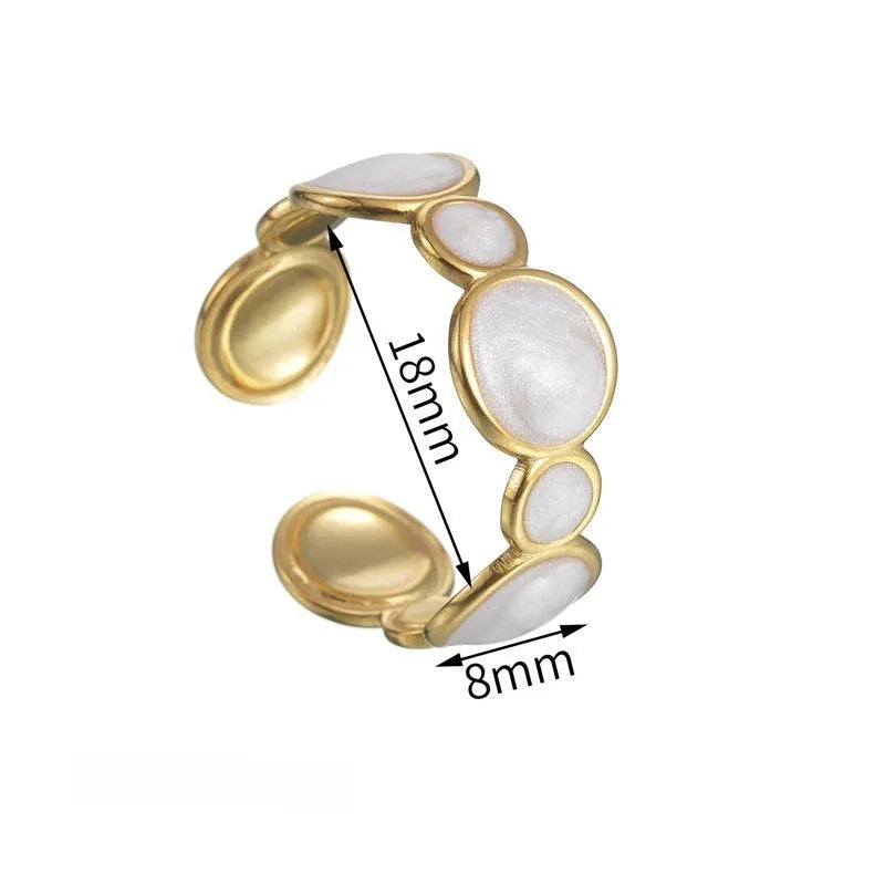 Adjustable geometric stainless steel ring with an electroplated finish for women.