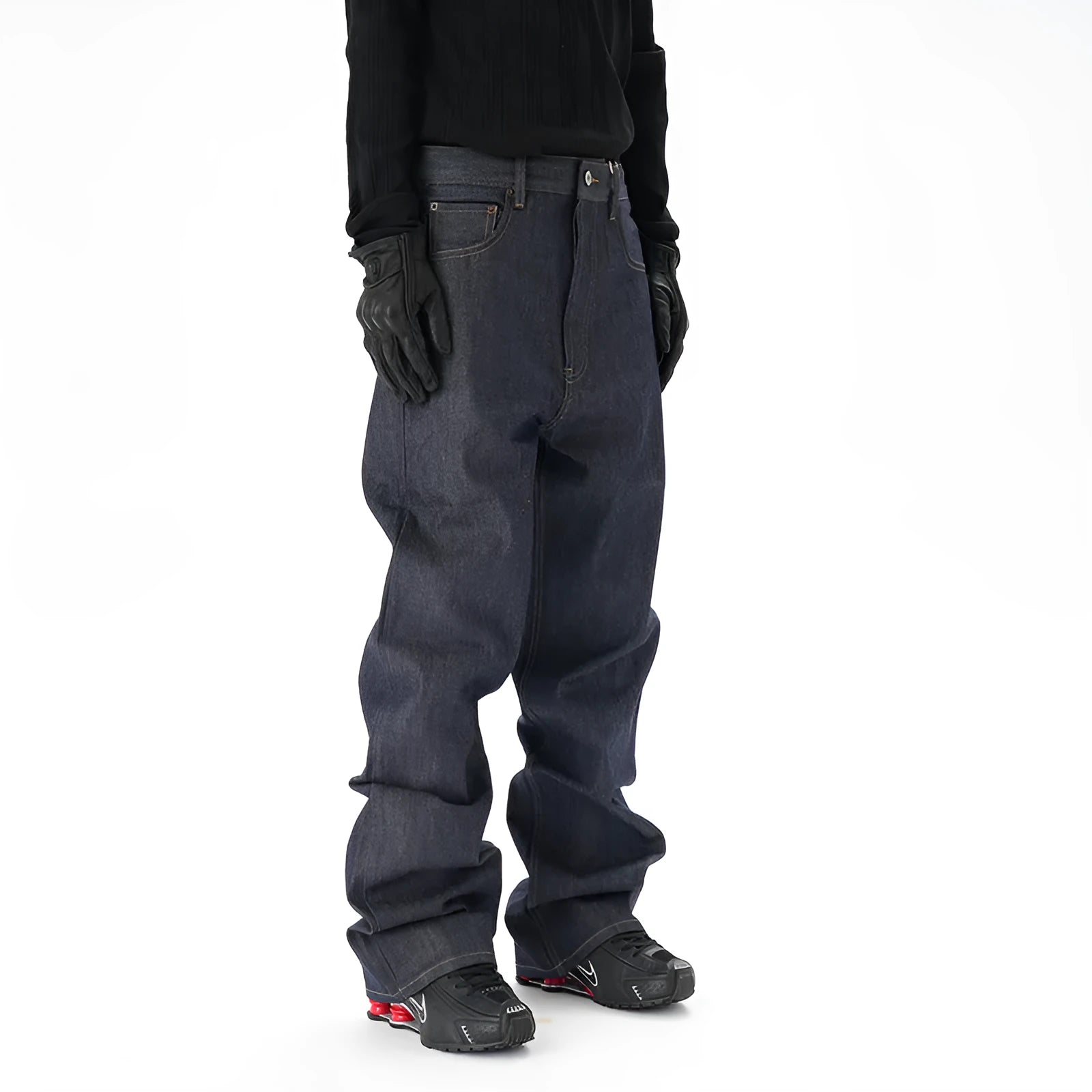 A pair of dark blue casual loose straight-cut jeans on a plain background.