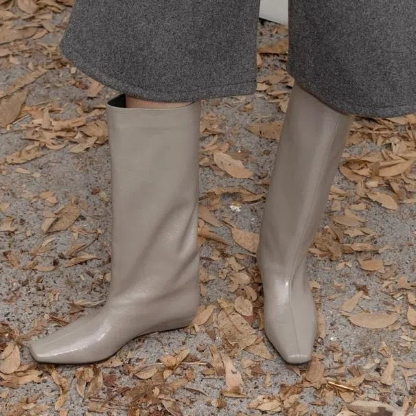 Women's black artificial PU leather knee-high boots with square toe, chunky heel, and non-slip rubber sole