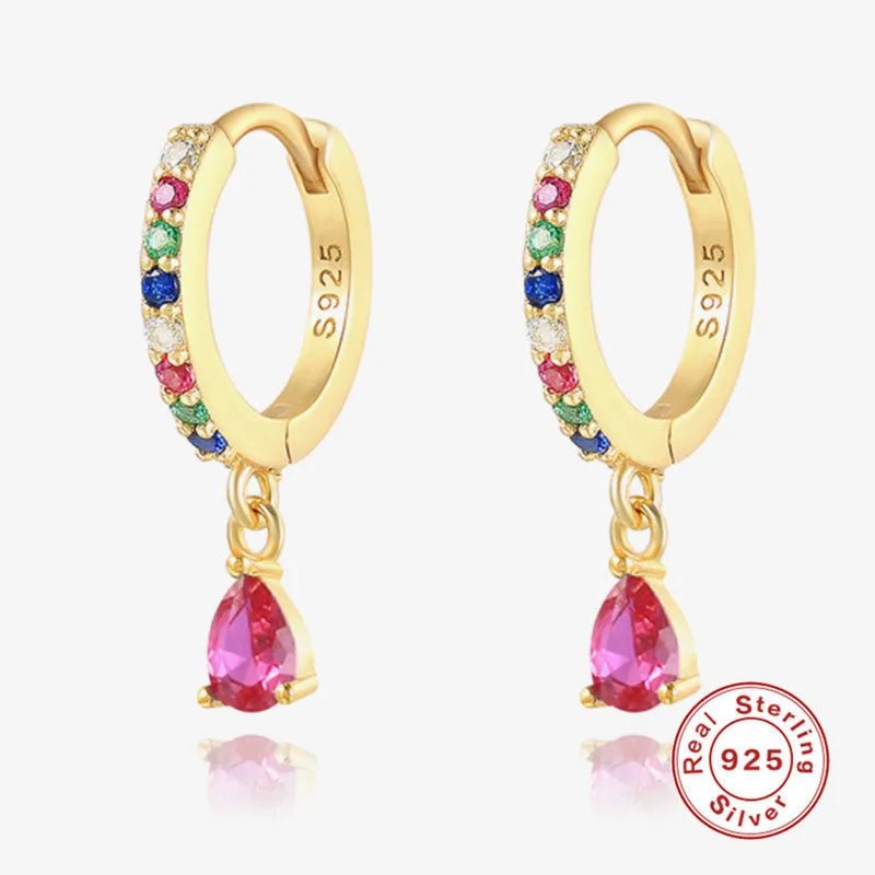 Sterling silver geometric water drop earrings with a gemstone accent on a gold or silver plated finish.