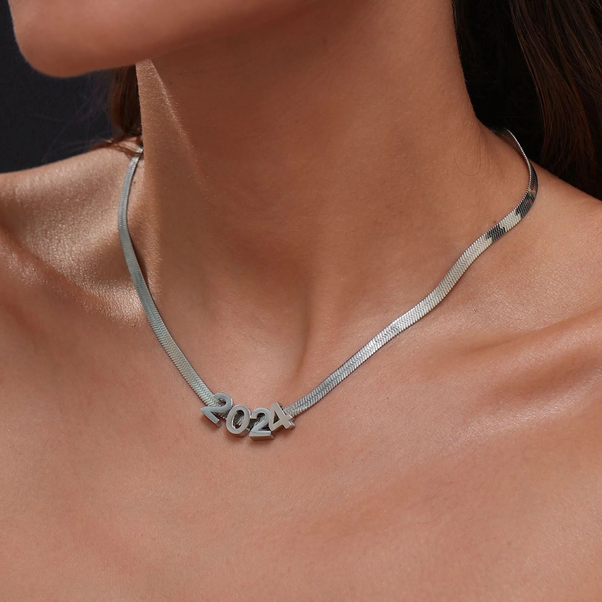 Gold electroplated titanium steel necklace with letter A pendant on a 40cm blade chain