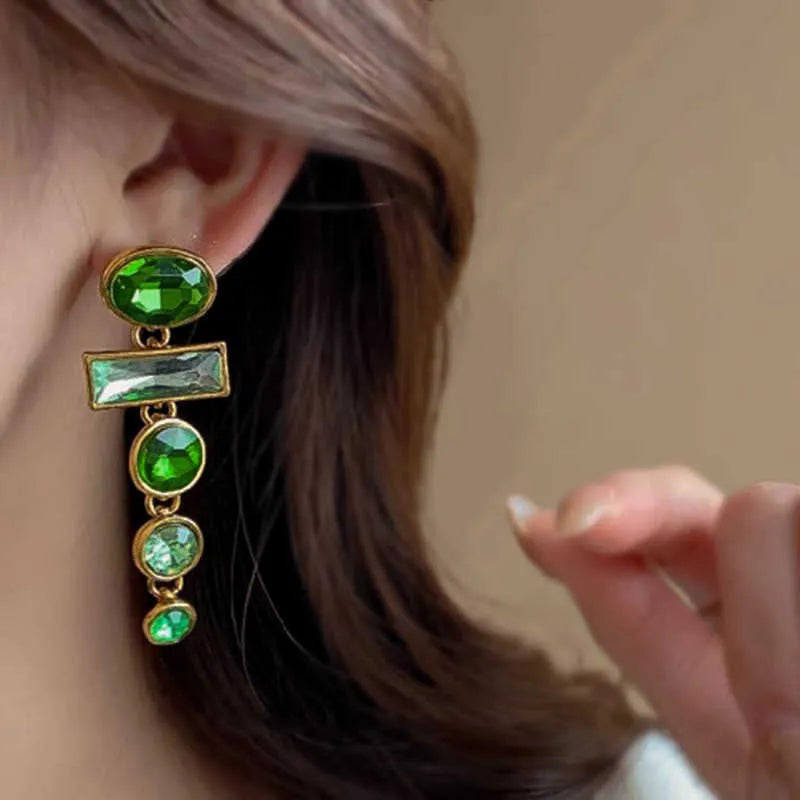 Pair of retro green gradient tassel earrings with geometric shape and inlaid zircon stones.