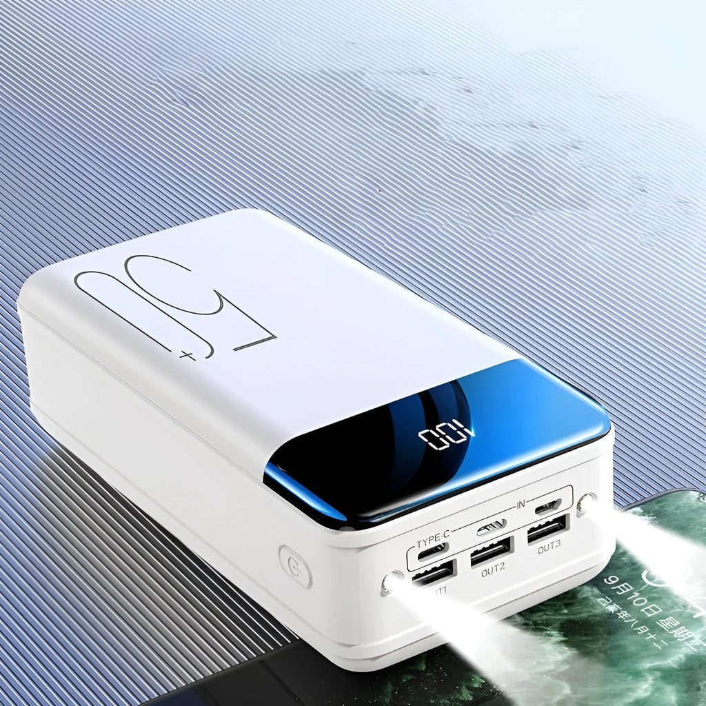 Black large capacity 50000mAh power bank showing three USB output ports on a white background.