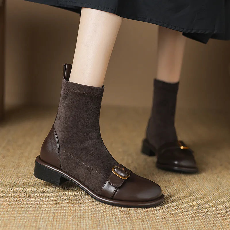 Women's black low heel ankle boots with lace-up front and decorative belt buckle stitching