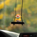 Yellow plastic duck doll car hanging ornament shown in four design variations.