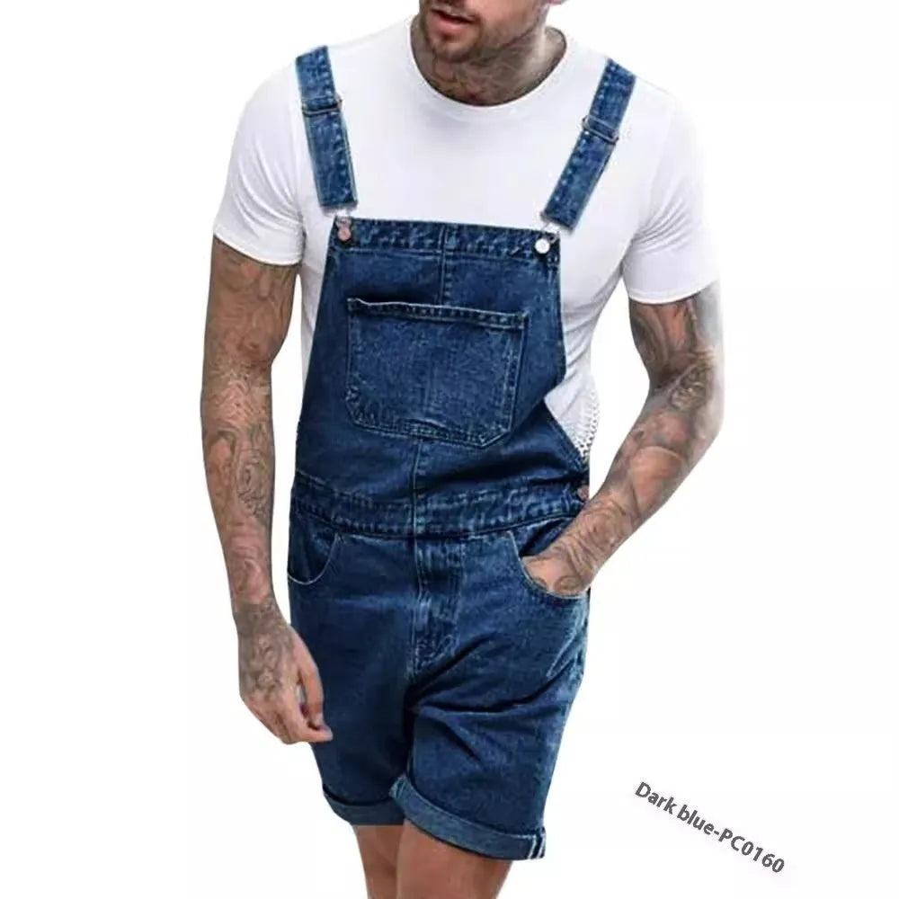 A pair of black denim suspender pants with a mid waist, zipper fly, and straight leg shorts cut on a mannequin.