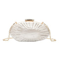 Retro oval one-shoulder crossbody bag in shell colour with hard acrylic shell and slit pocket