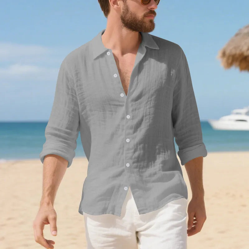 Linen casual shirt in a loose American fit on a hanger, shown in an earthy yellow colour.