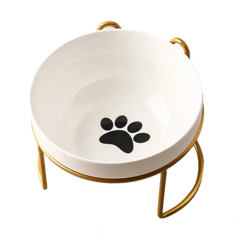 White ceramic cat bowl with cat paw pattern and black iron frame with cat ears