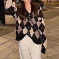 Women's acrylic knitted cardigan coat in macaron colours including pink, green, and khaki, regular sleeve, casual style.