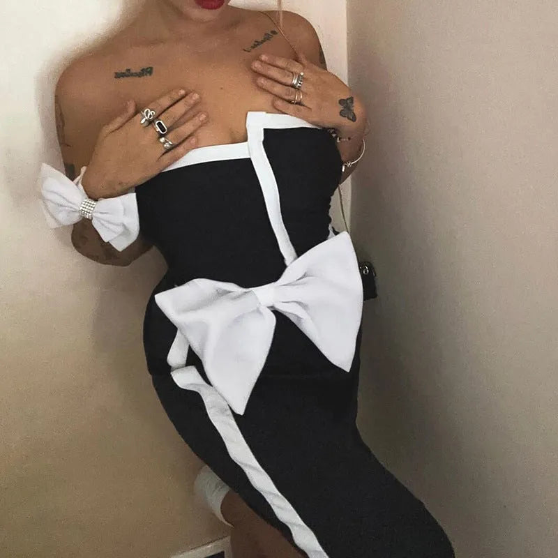 Black and white colour-block women's swimsuit with bow detail and irregular tube top