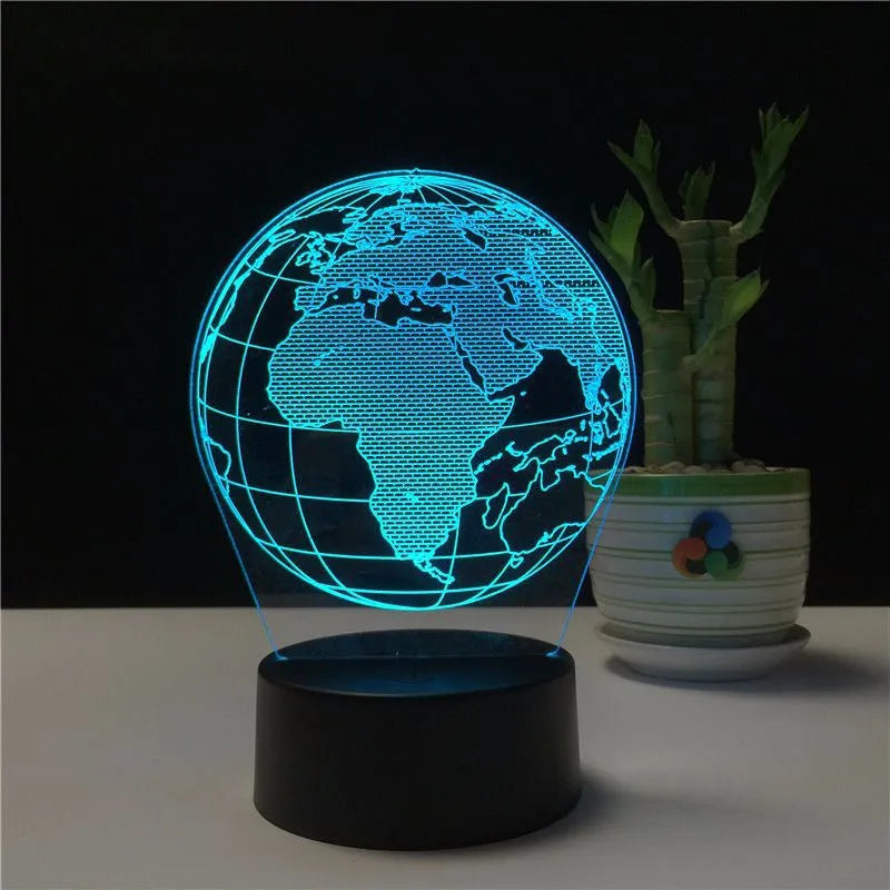 3D Earth globe USB night light on a desk showing seven colour modes with remote control
