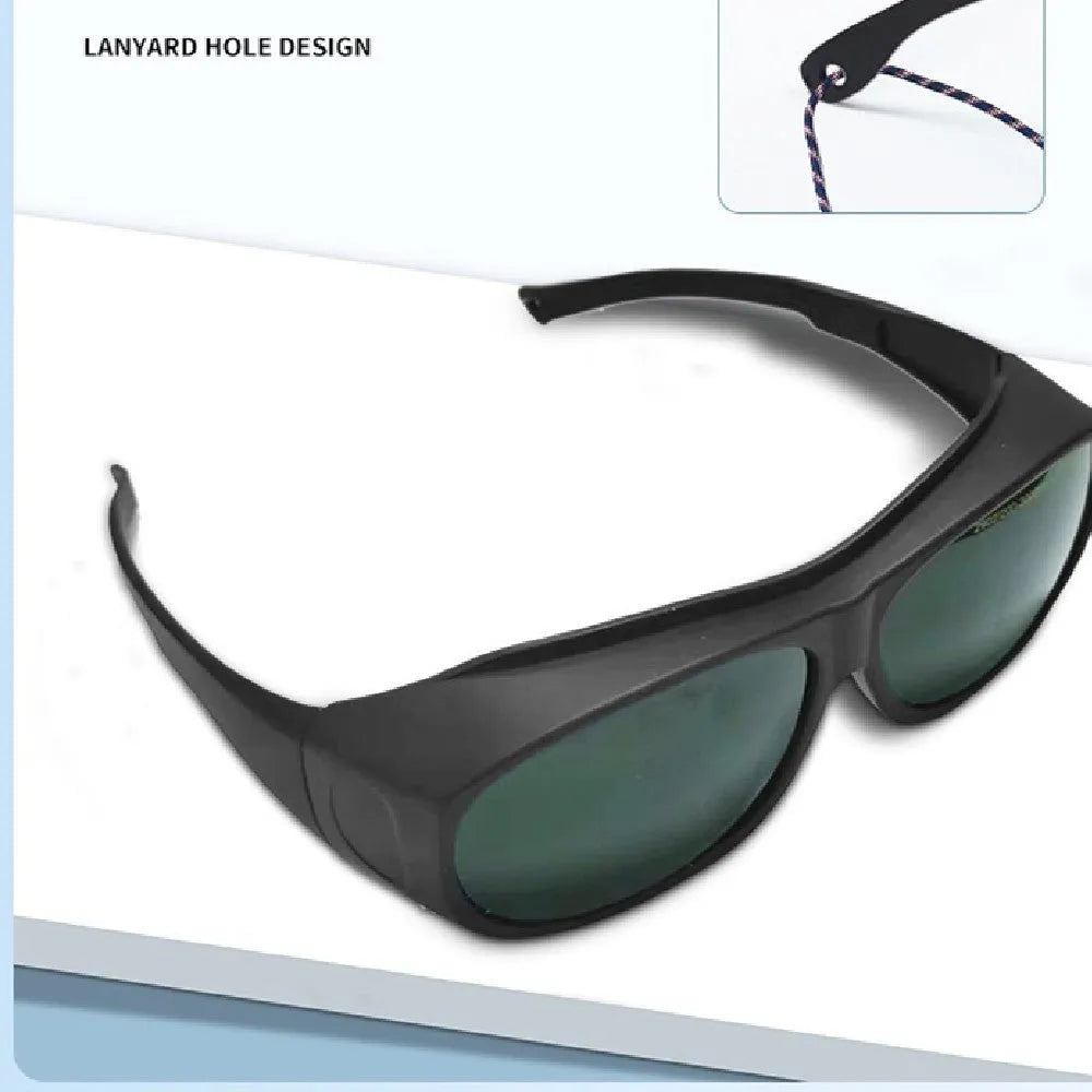 A pair of clear polycarbonate laser safety goggles for welding and skin treatment protection.