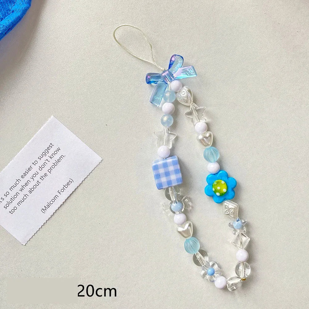 Beaded flower mobile phone lanyard in yellow, blue and pink colour options with plastic resin construction