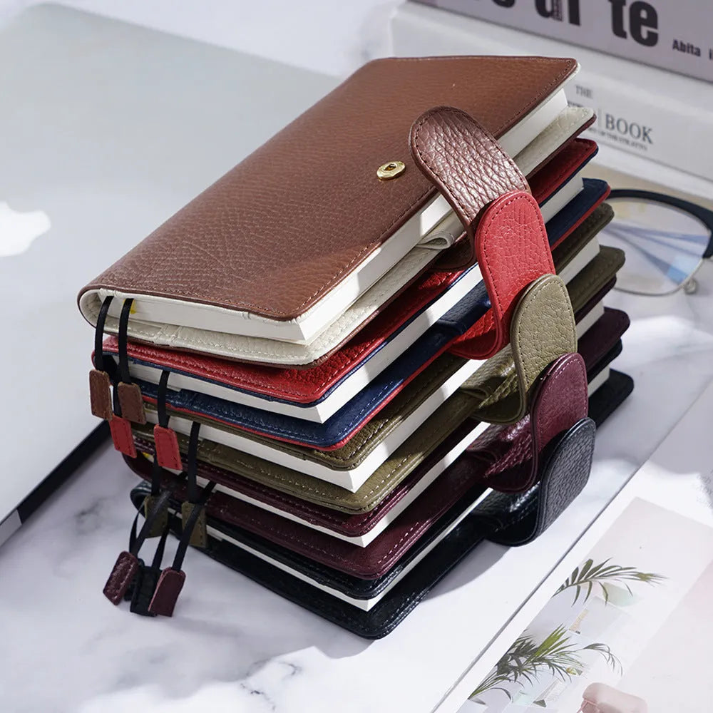 A6 size leather loose-leaf diary with a textured lychee pattern cowhide cover